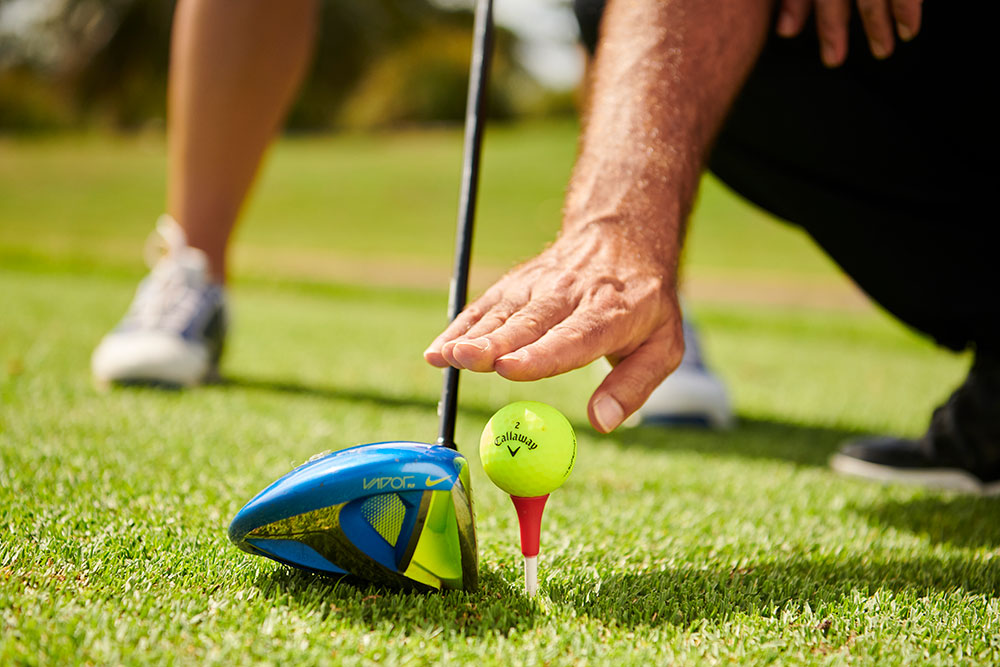 golf coach on tee height